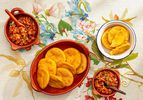 Overhead view of sopaipillas with pebre