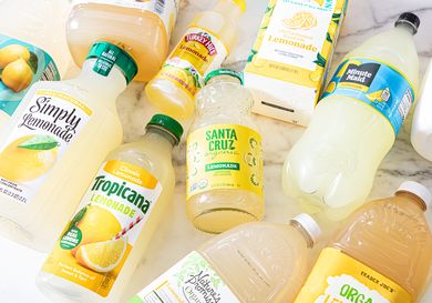 Assorted bottles and cartons of lemonade displayed on a surface