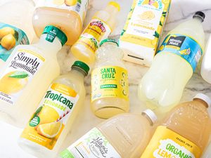Assorted bottles and cartons of lemonade displayed on a surface