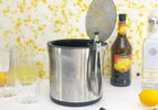 oxo ice bucket on a white tile surface