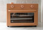 The Our Place Large Wonder Oven on a gray kitchen counter